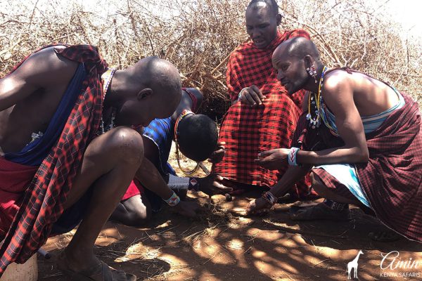 masai-warriors-putting-on-fire-traditionally-amin-kenya-safaris masai-warriors-putting-on-fire-traditionally-amin-kenya-safaris